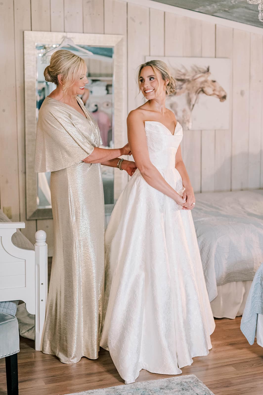 449011242_1000952562037344_5097670796165724287_n mother buttoning bride's dress