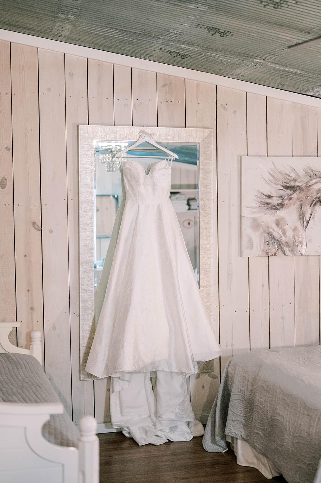 449467182_1000952622037338_3953318903165251097_n bridal gown hanging on mirror