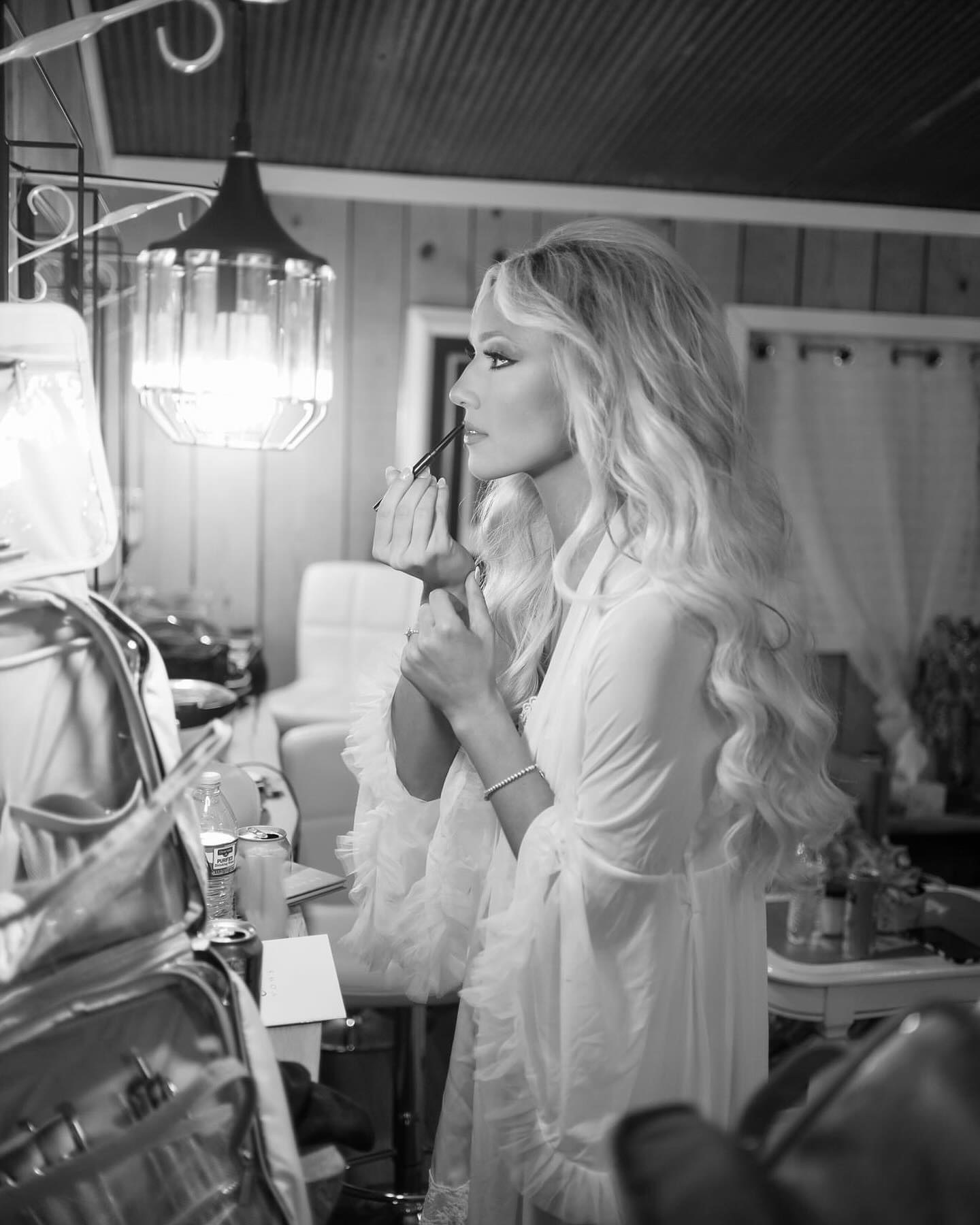 455883707_1037955205003746_8718424378895223625_n bride putting on lipstick