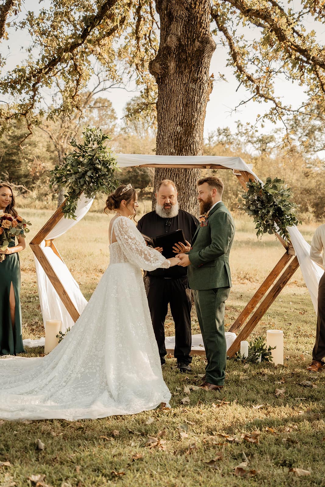 461933779_1072931338172799_7114170385474590447_n bride and groom saying vows during outdoor wedding ceremony